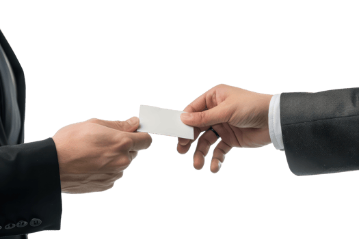 Two hands exchanging a business card in a professional setting, symbolizing networking, business connections, and corporate communication. png