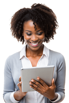Young woman smiling while using a tablet indoors png