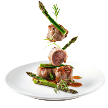floated Lamb and Aparagus falling into a plate isolate on transparency background png