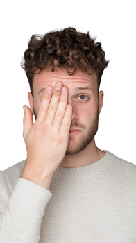 Man covering one eye with hand, looking serious on transparent background png