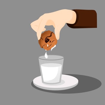 Dip cookies or biscuit in a glass of milk vector