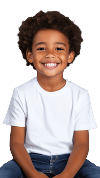 Laughing boy with curly hair in white shirt sitting, hands on knees, transparent background png