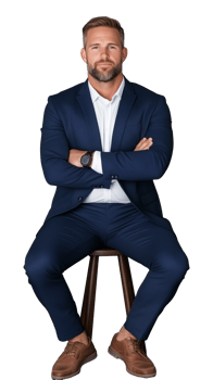 Businessman in blue suit sitting with arms crossed, confident and professional, transparent background png