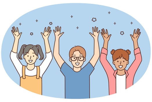 Smiling children raise hands playing together vector