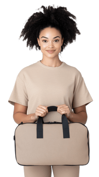 Smiling young woman holding a beige bag on transparent background, casual and relaxed look, travel concept png