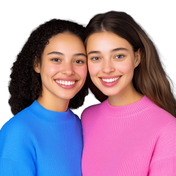 Two happy young women in colorful sweaters posing together on transparent background png