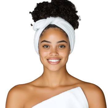 Smiling woman with curly hair in headband and white towel in spa setting on a transparent background png