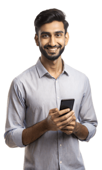 Young man smiling while using smartphone indoors png