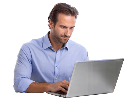 Man working intently on a laptop at home png