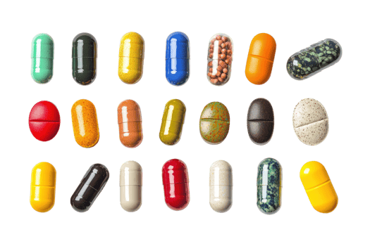 A variety of colorful capsules and pills arranged in rows, showcasing different shapes, sizes, and colors on a transparent background. png