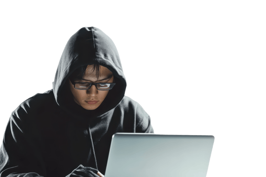 A person in a hoodie and glasses working on a laptop, symbolizing cybersecurity, technology, and hacking in a modern digital age. png