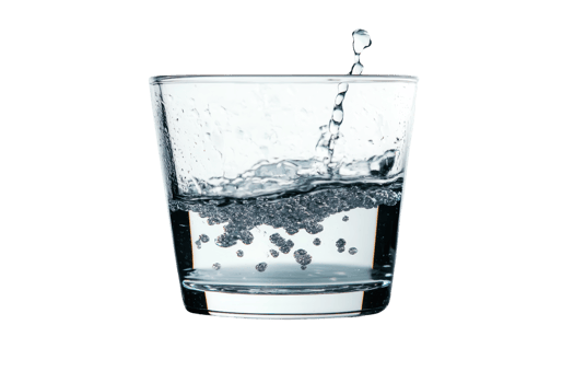 Close-up of a clear glass of water, capturing the dynamic splash and bubbles, isolated on a transparent background. png