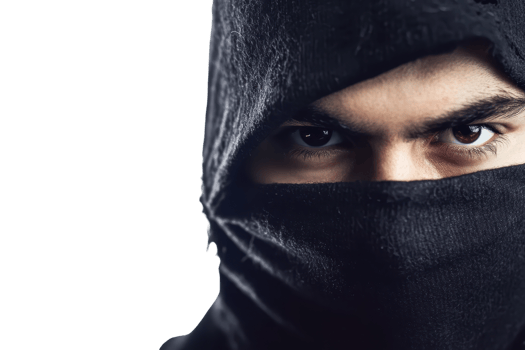 Close-up of a mysterious person with intense eyes covered by a black cloth, conveying secrecy and intrigue against a dark background. png