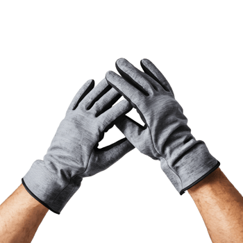 Two hands holding up a pair of gloves png