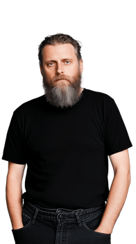Serious middle-aged man with beard in black shirt, isolated on transparent background png