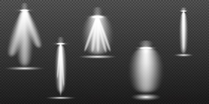 a set of four white light beams on a black background vector