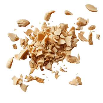 Crushed peanut pieces spread out on a transparent surface, showcasing their texture and color under natural light, Peanut crushed into pieces png