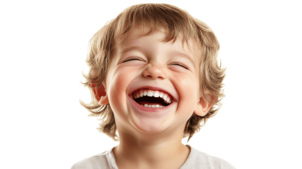 A joyful young boy with curly hair laughing heartily, capturing the essence of childhood happiness and innocence. png