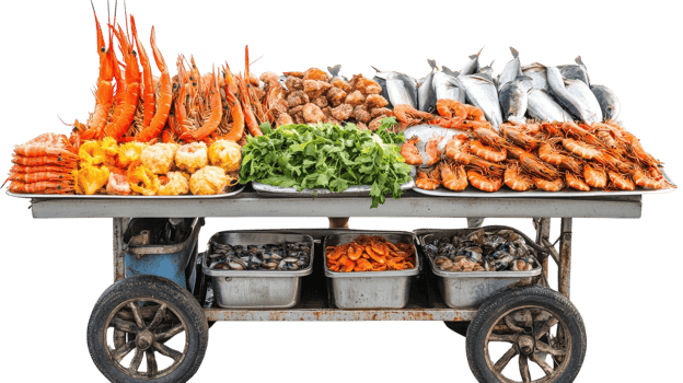 Fresh seafood cart featuring a wide variety of shrimp, fish, and vegetables displayed in a bustling market setting. png