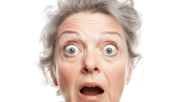 Expressive Image of a Mature Woman with a Look of Disbelief Captured in Natural Light for Use in Emotional or Dramatic Themes. png