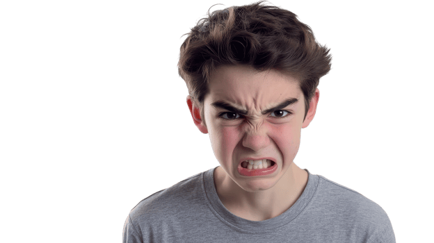 A young boy with an angry face png