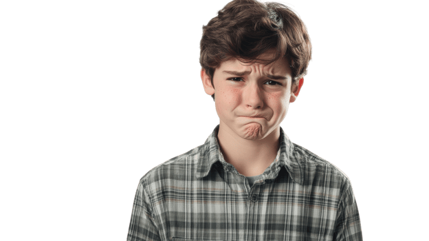 A boy with a sad face looking at the camera png