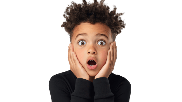 A young boy with his mouth open and a shocked expression png