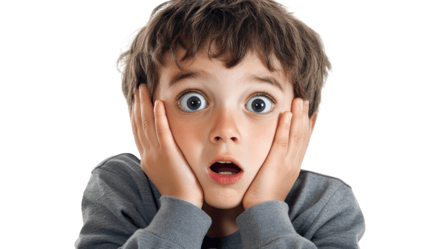 A young boy is holding his hands to his face png
