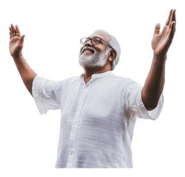 Joyful man celebrating with arms raised outdoors png