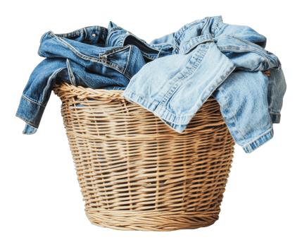 Laundry basket filled with denim in bright room png