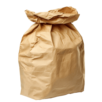 Brown paper bag filled with various items on table png