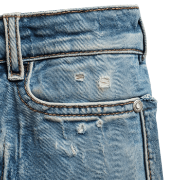 Denim jeans with distressed details in blue hue png