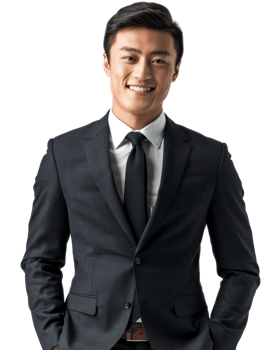 Smiling man in a dark suit with hands in pockets isolated on transparent background png