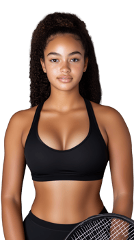 Athletic young woman in sports attire holding a tennis racket on transparent background png