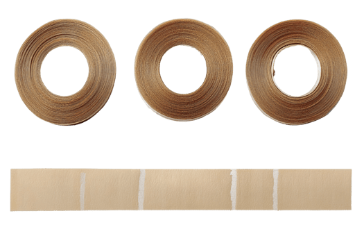 Beige tapes rolls and sample strips on transparent background png