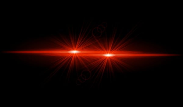 Dual red starburst. Bright intersecting beams, glowing particles, radiant light effects, warm illumination, abstract lighting design, futuristic energy, decorative visuals vector