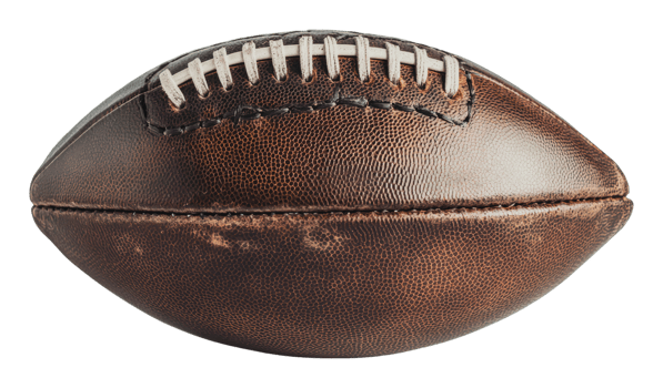 Vintage football resting on a flat surface png