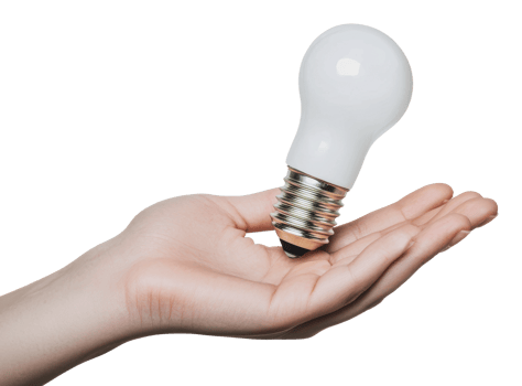 Hand holding a light bulb in a bright setting png