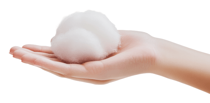 Soft foam resting on a hand in a bright setting png