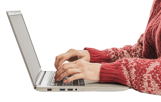 Hands typing on a laptop while wearing a sweater png