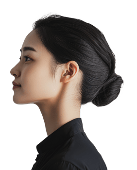 Profile view of a woman with a sleek bun hairstyle png
