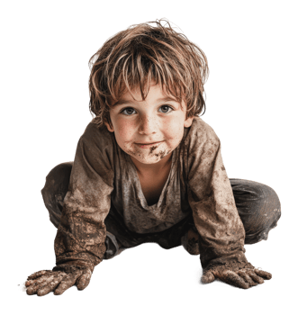 Child playing in mud with a joyful expression png