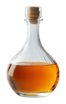 Elegant glass decanter filled with amber liquid png