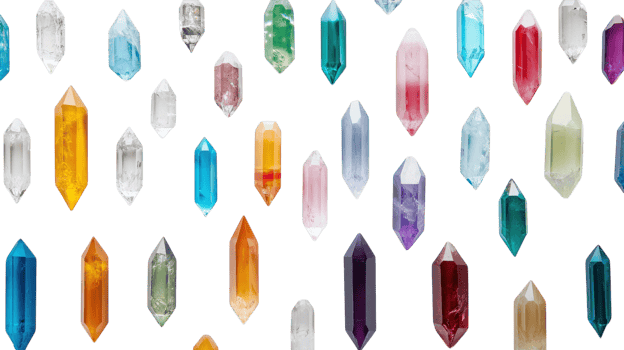 A Colorful Collection of Small Crystals for Decorative and Craft Uses, Perfect for Jewelry Making and Home Decor Projects. png