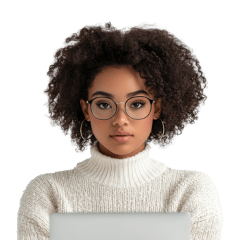 Young black woman in glasses working on laptop indoors with focused expression png