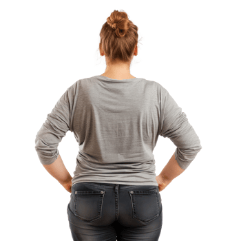 a woman in jeans standing with her hands on her hips png
