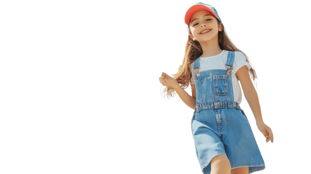 Trendy and Stylish Girl in a Denim Overall Dress Paired with Sneakers Perfect for Casual Outings and Fashionable Events. png