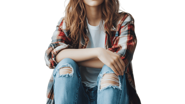 Stylish Young Woman Wearing a Flannel Shirt and Ripped Denim Jeans, Perfect for Fashion and Lifestyle Blogs. png