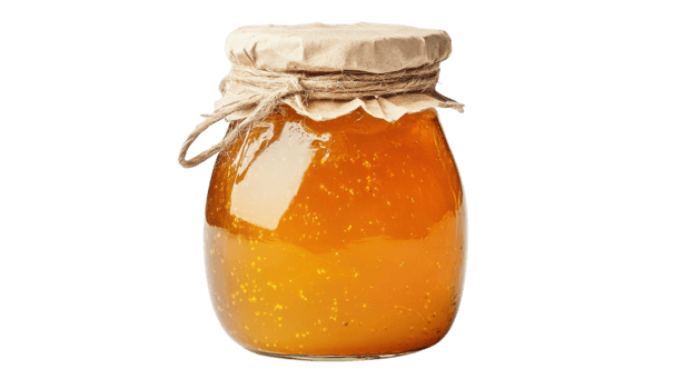 A Jar of Freshly Made Fruit Preserves Captured in a Rustic Setting Ideal for Home Cooking and Culinary Blogs. png