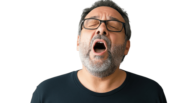 A middle aged man yawning with tired eyes, capturing the essence of exhaustion and the need for rest, perfect for wellness and lifestyle articles focusing on sleep and fatigue.. png
